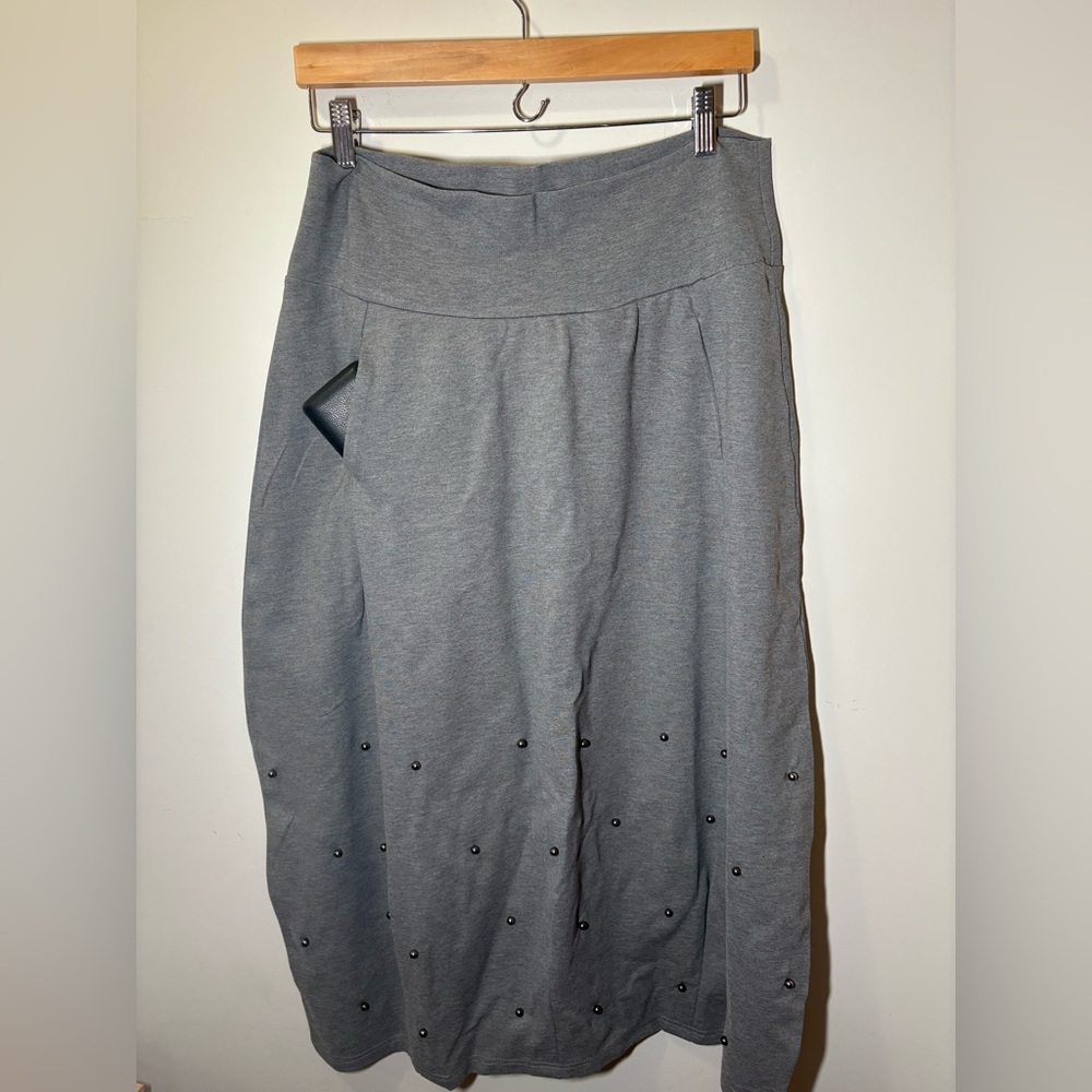 Bell shaped skirt with baubles
